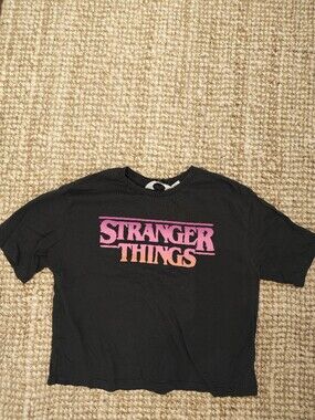 H&M Black "Stranger Things" Graphic Tee with Pink and Orange Logo